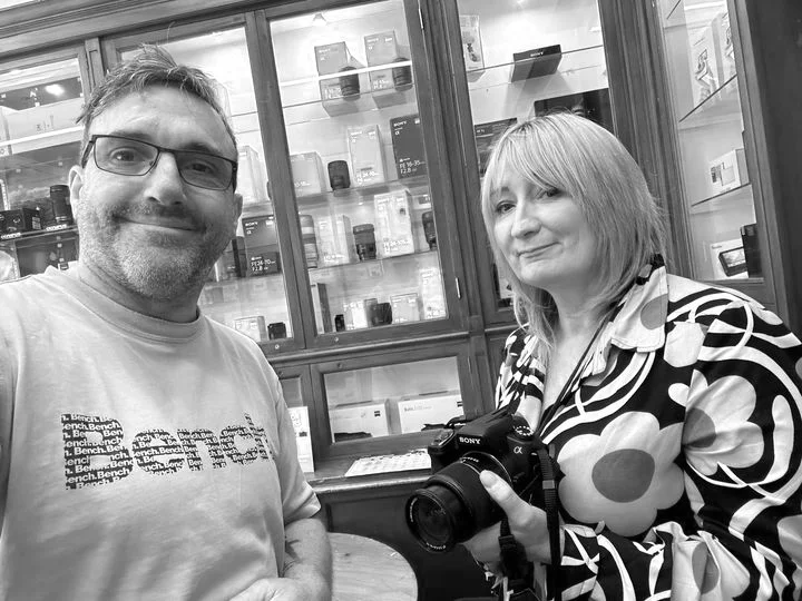 Sarah from Cambrian Photography in Colwyn Bay donating a camera.